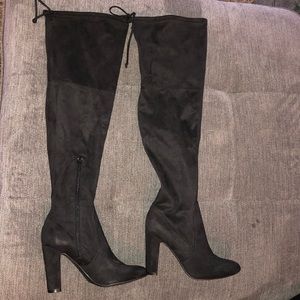 Black thigh high heel boots